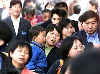 Великое переселение китайцев из деревни в город. Урбанизация поможет избавиться от экспортной зависимости